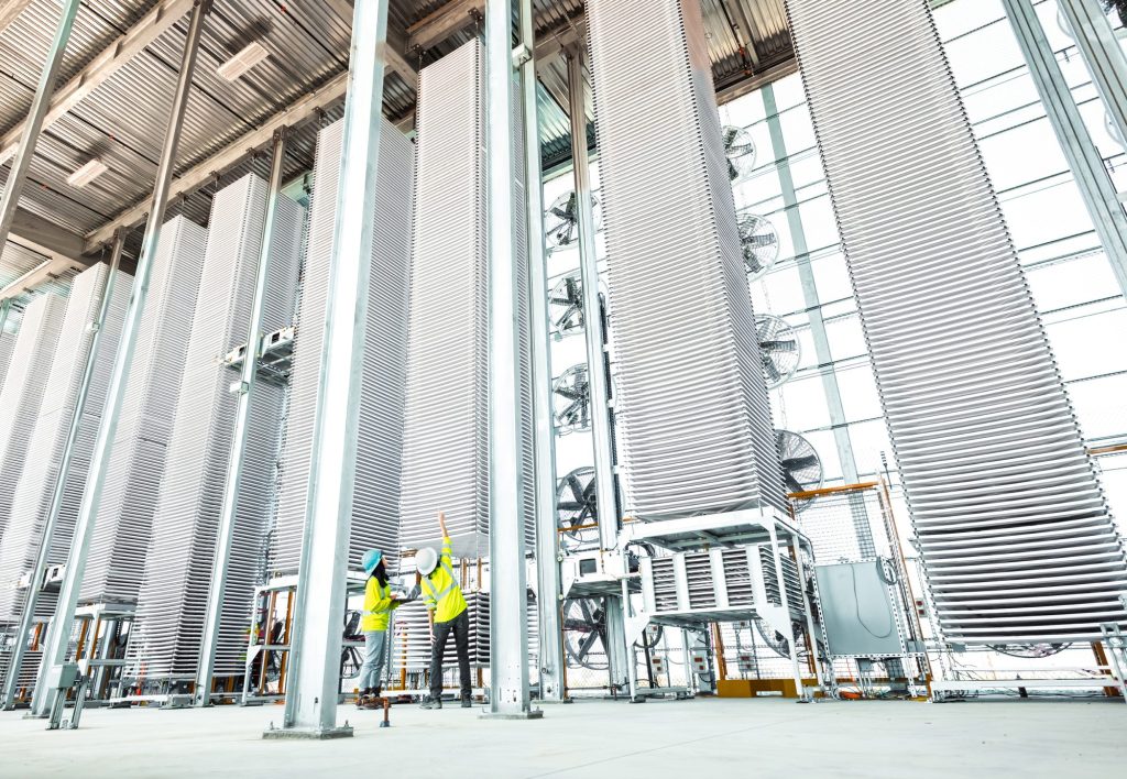 Workers at Heirloom's direct air capture facility in Tracy, California