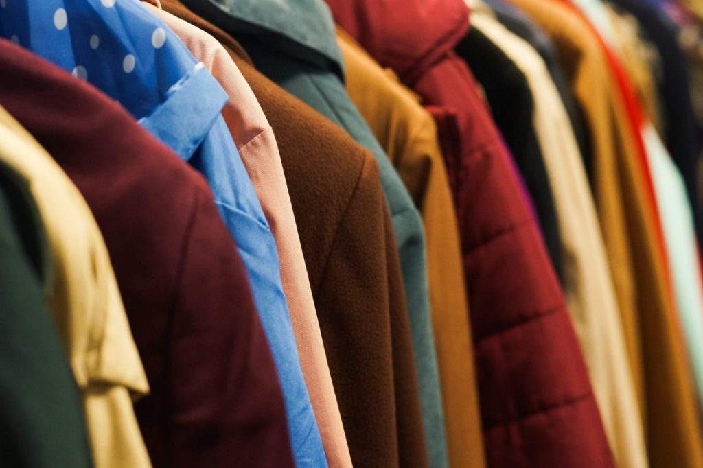 Rack of colorful coats.