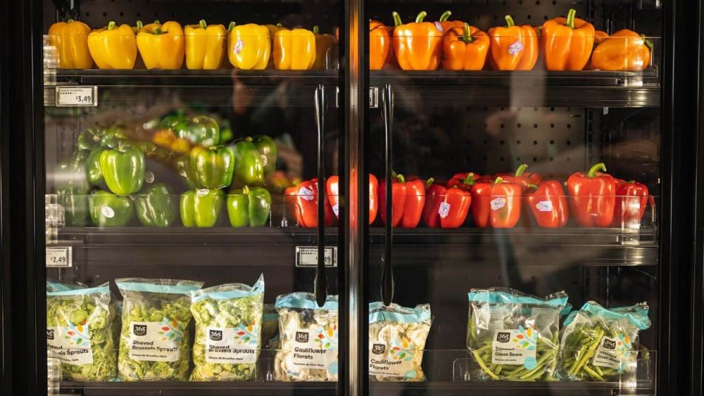 Vegetables shown in a refrigeration case at a grocery store